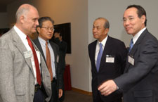 (L-R) Gunter Dufey, E. Han Kim, Hirokazu Ishikawa and Tak Wakasugi
